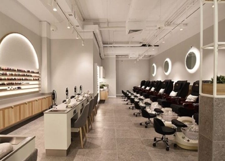Elegant nail care area at POLISH INDOOROOPILLY, Indooroopilly, Queensland, AU with chic seating and modern decor.