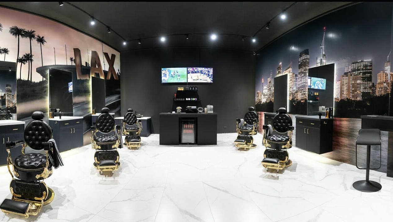 Elegant barbershop interior at ACE OF FADEZ LANE COVE, Lane Cove, New South Wales, AU with sleek chairs and decor.