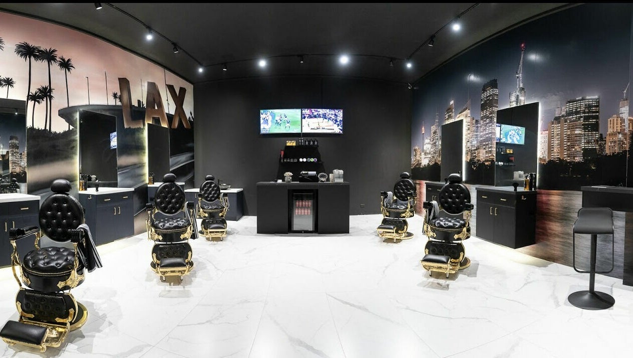 Elegant barbershop interior at ACE OF FADEZ LANE COVE, Lane Cove, New South Wales, AU with sleek chairs and decor.