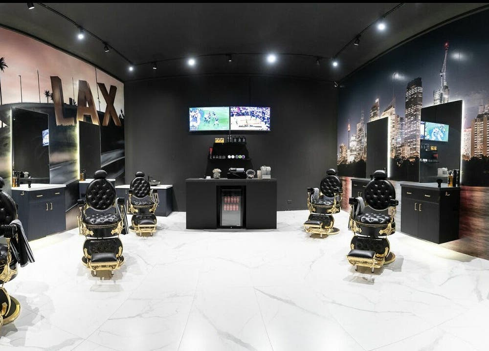 Elegant barbershop interior at ACE OF FADEZ LANE COVE, Lane Cove, New South Wales, AU with sleek chairs and decor.