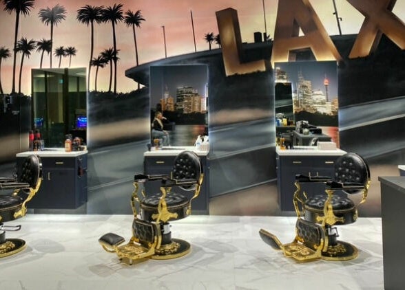 Elegant barbershop interior at ACE OF FADEZ LANE COVE, Lane Cove, New South Wales, AU with luxury chairs and decor.