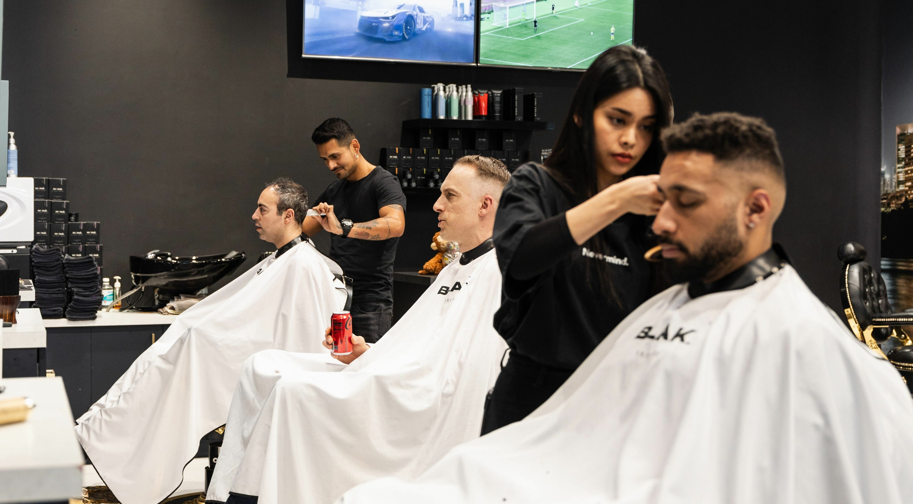 Stylists at ACE OF FADEZ LANE COVE expertly cutting hair. Lane Cove, New South Wales, AU.