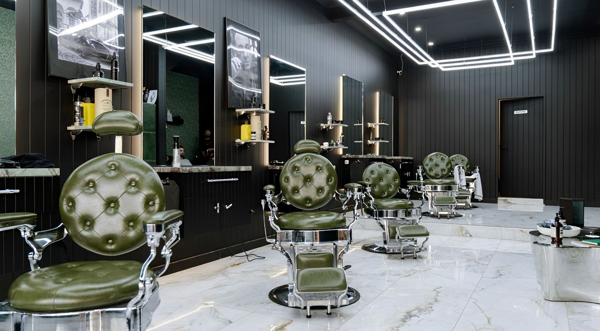 ACE OF FADEZ CROWS NEST barbershop interior with green chairs in Crows Nest, New South Wales, AU.