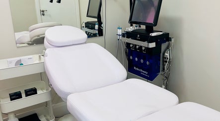 Modern treatment room at Aesthetic Skin Lab Ireland, Dublin, County Dublin, IE featuring Hydra Beauty equipment.