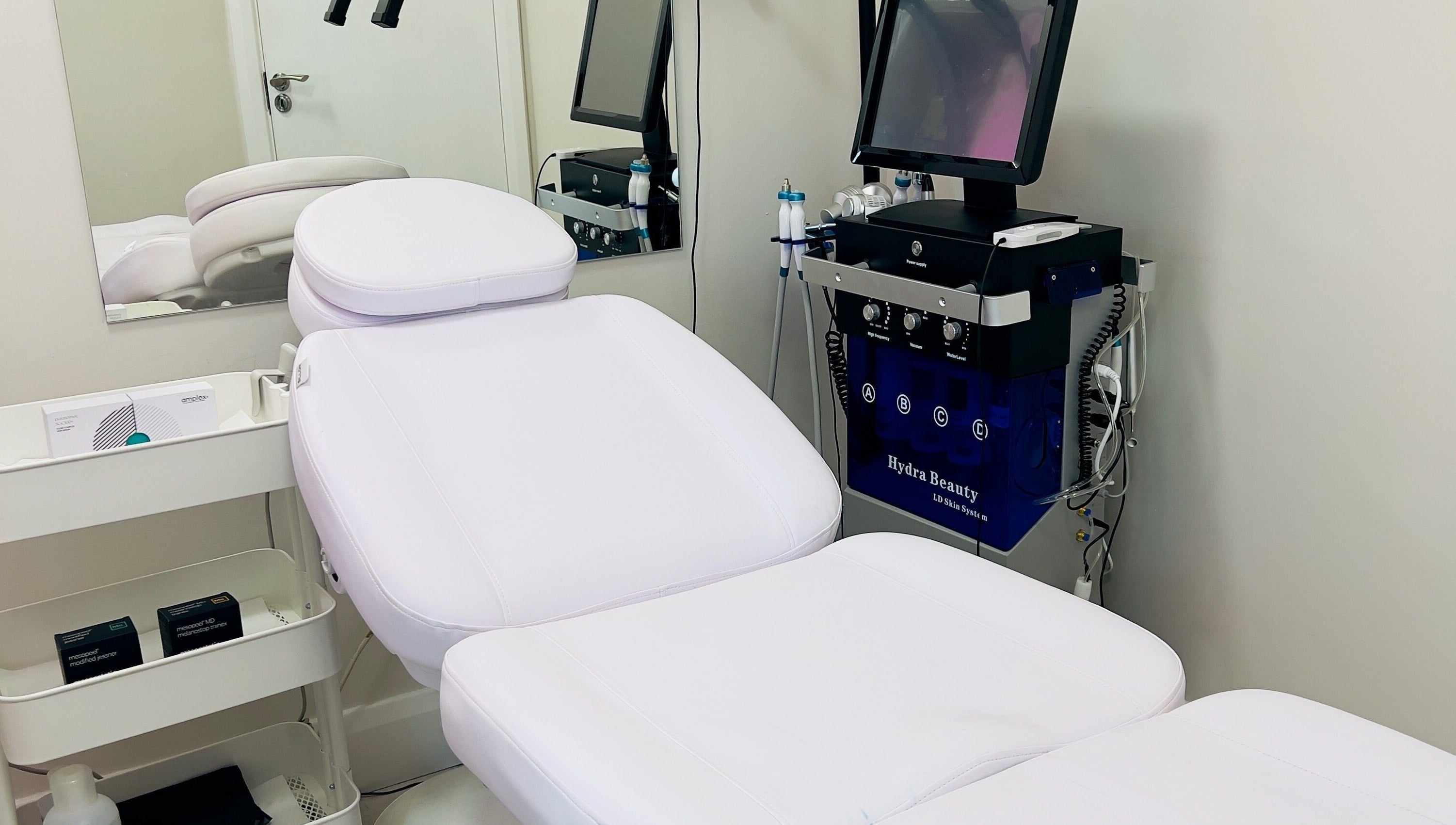Modern treatment room at Aesthetic Skin Lab Ireland in Dublin, Dublin 15, IE, showcasing sleek equipment.