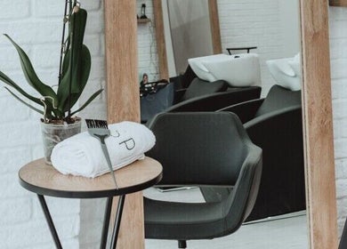 Modern sleek interior of Salon Inspire, kv. Manastirski livadi, София, BG with stylish chairs and decor.