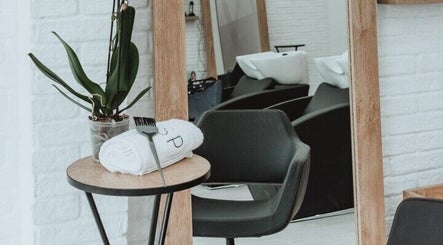 Modern sleek interior of Salon Inspire, kv. Manastirski livadi, София, BG with stylish chairs and decor.