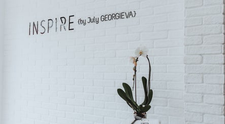 Elegant interior at Salon Inspire, kv. Manastirski livadi, София, BG with white orchid and textured wall.