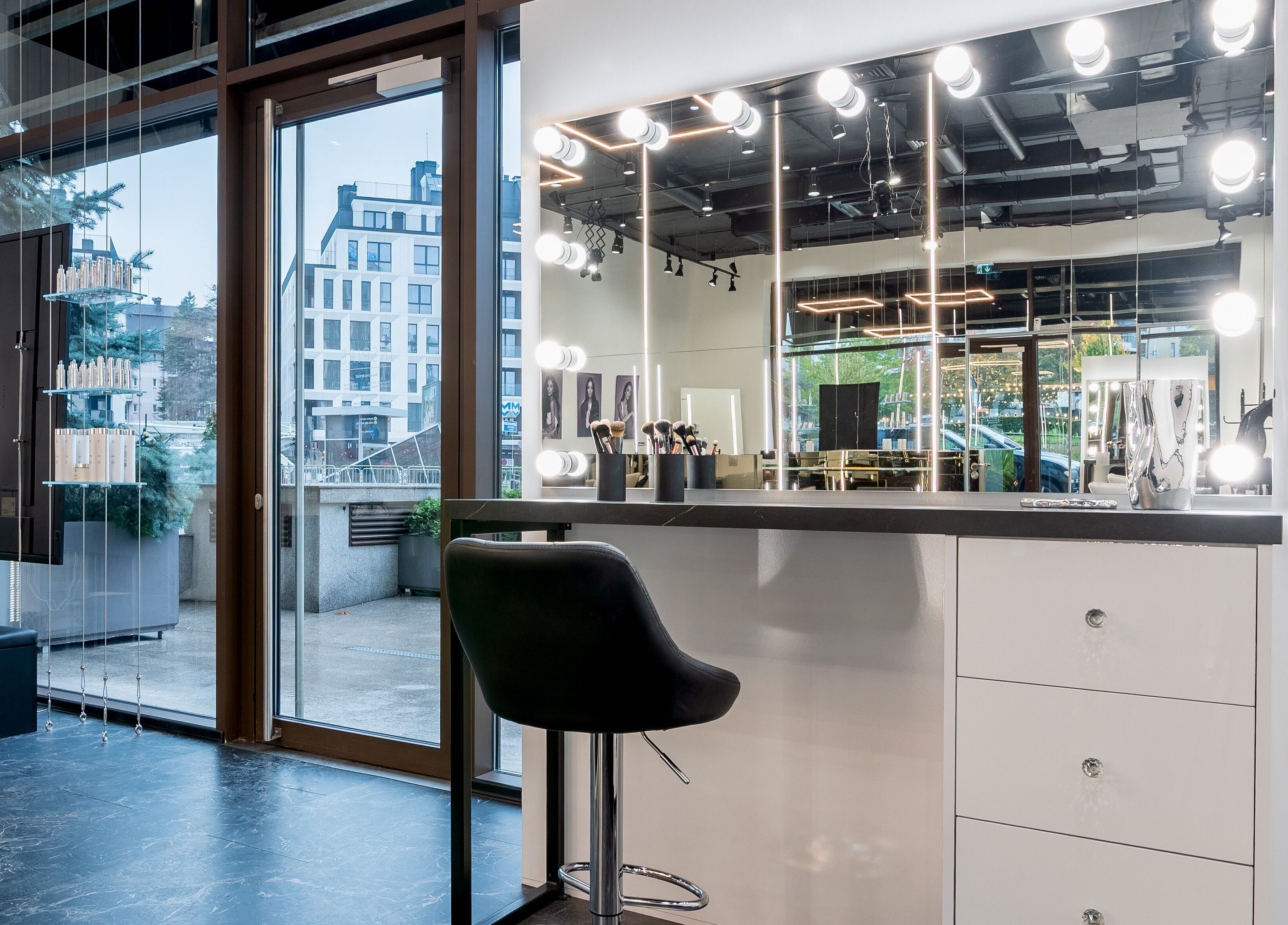 Elegant makeup station at Salon Inspire kv. Hladilnika Paradise Mall, София, BG, with illuminated mirrors.