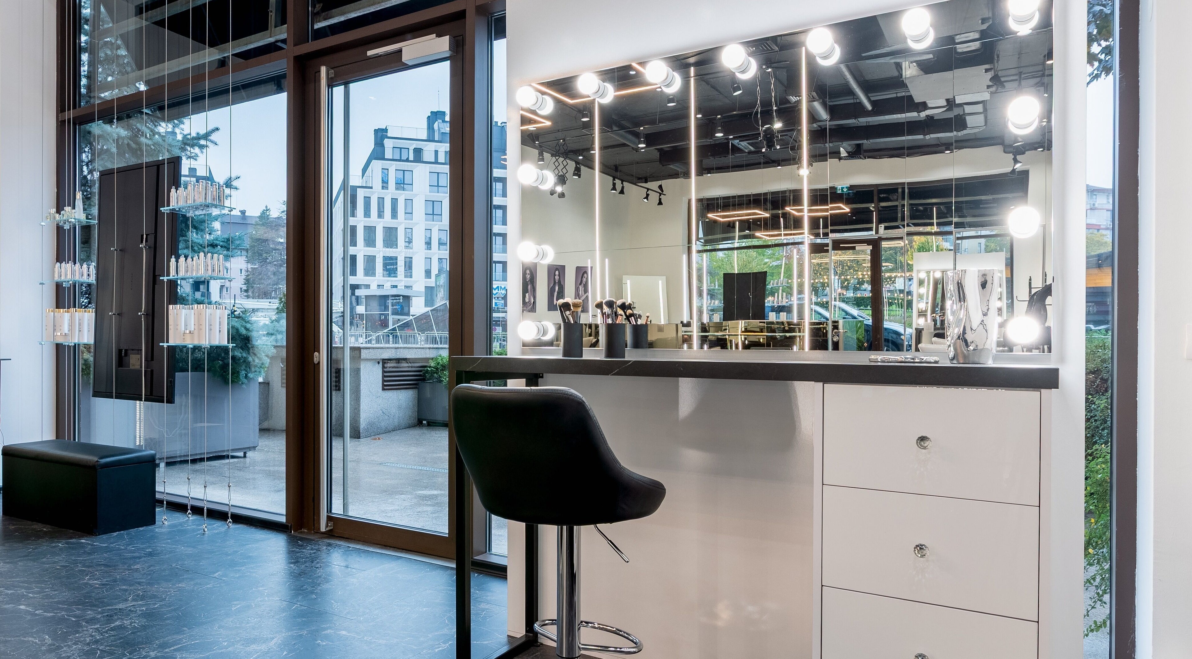 Elegant makeup station at Salon Inspire kv. Hladilnika Paradise Mall, София, BG, with illuminated mirrors.