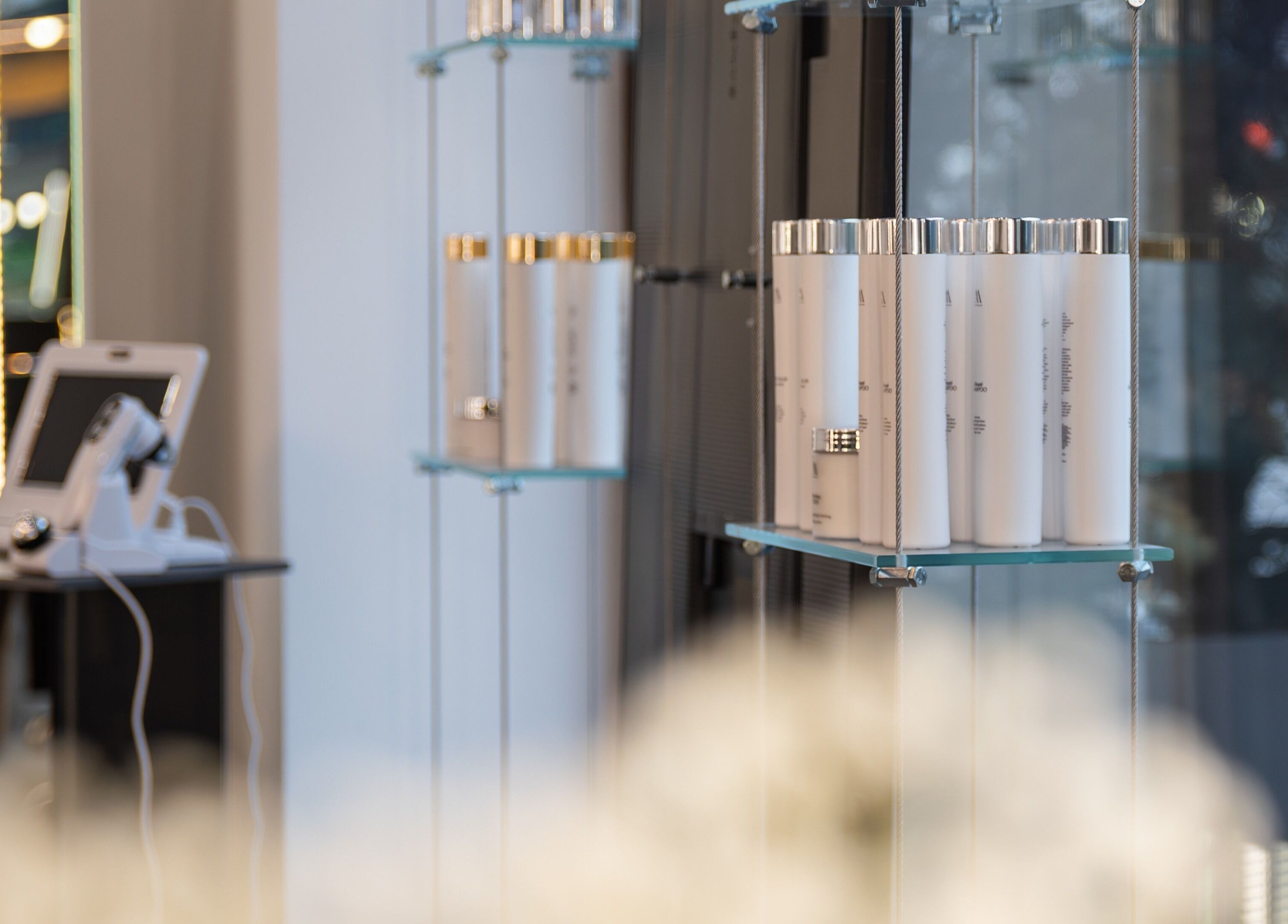 Product display at Salon Inspire kv. Hladilnika Paradise Mall, София, BG showcasing beauty essentials.