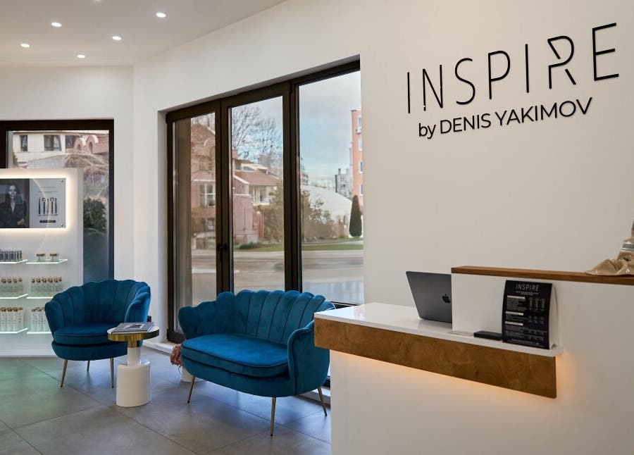 Elegant waiting area at Salon Inspire, kv. Krustova vada, София, Област София, BG with chic blue furniture.