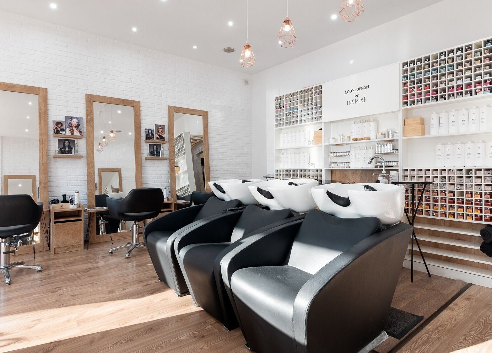 Interior of Salon Inspire, kv. Manastirski livadi, София, BG, featuring styling chairs and color stations.