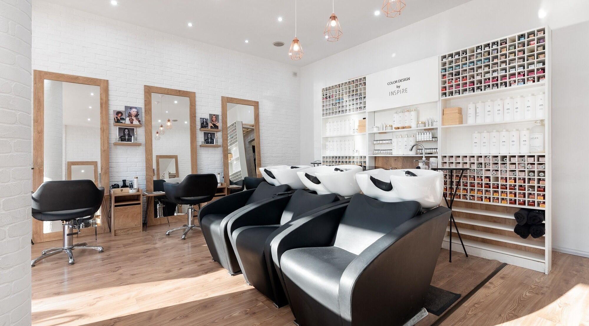 Interior of Salon Inspire, kv. Manastirski livadi, София, BG, featuring styling chairs and color stations.