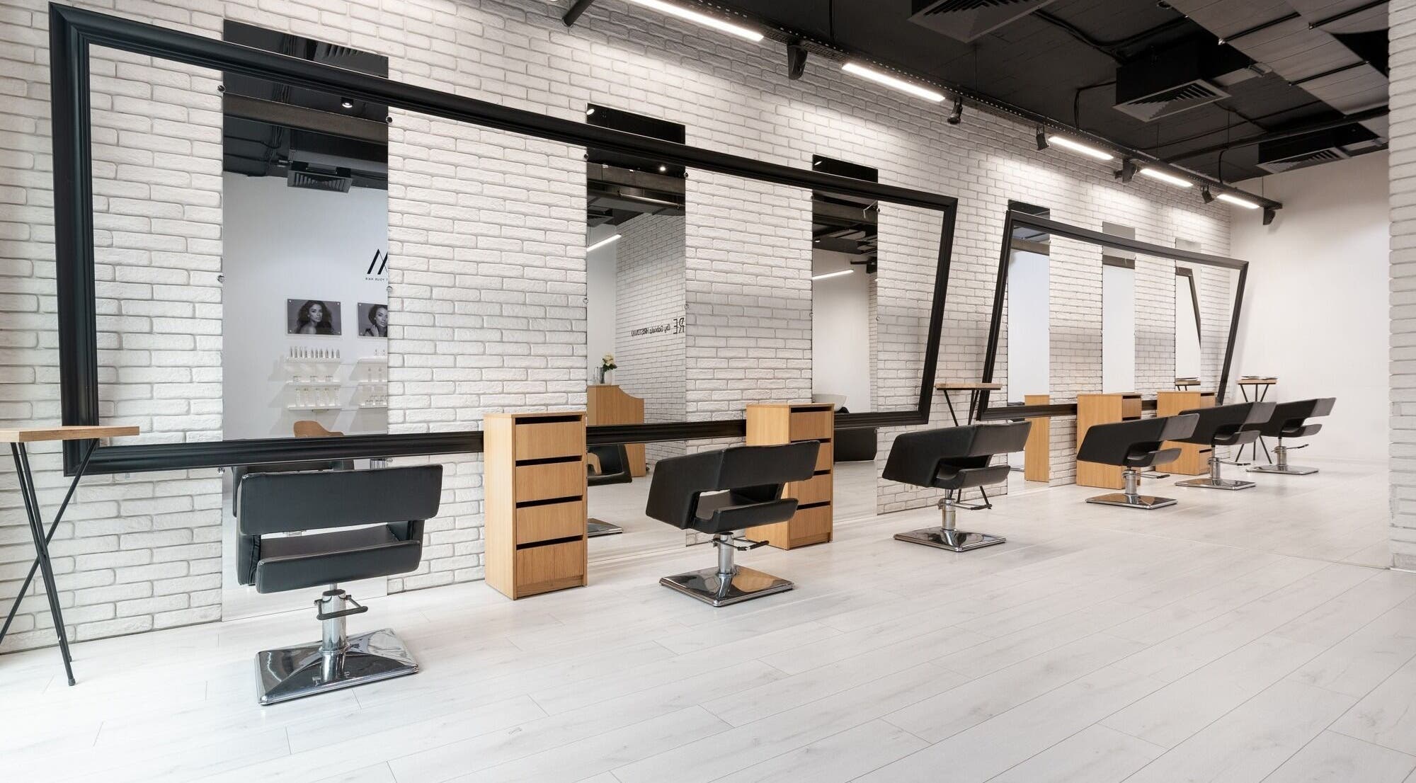 Sleek and modern styling stations at Salon Inspire, kv. Mladost 1, София, BG, showcasing elegance.