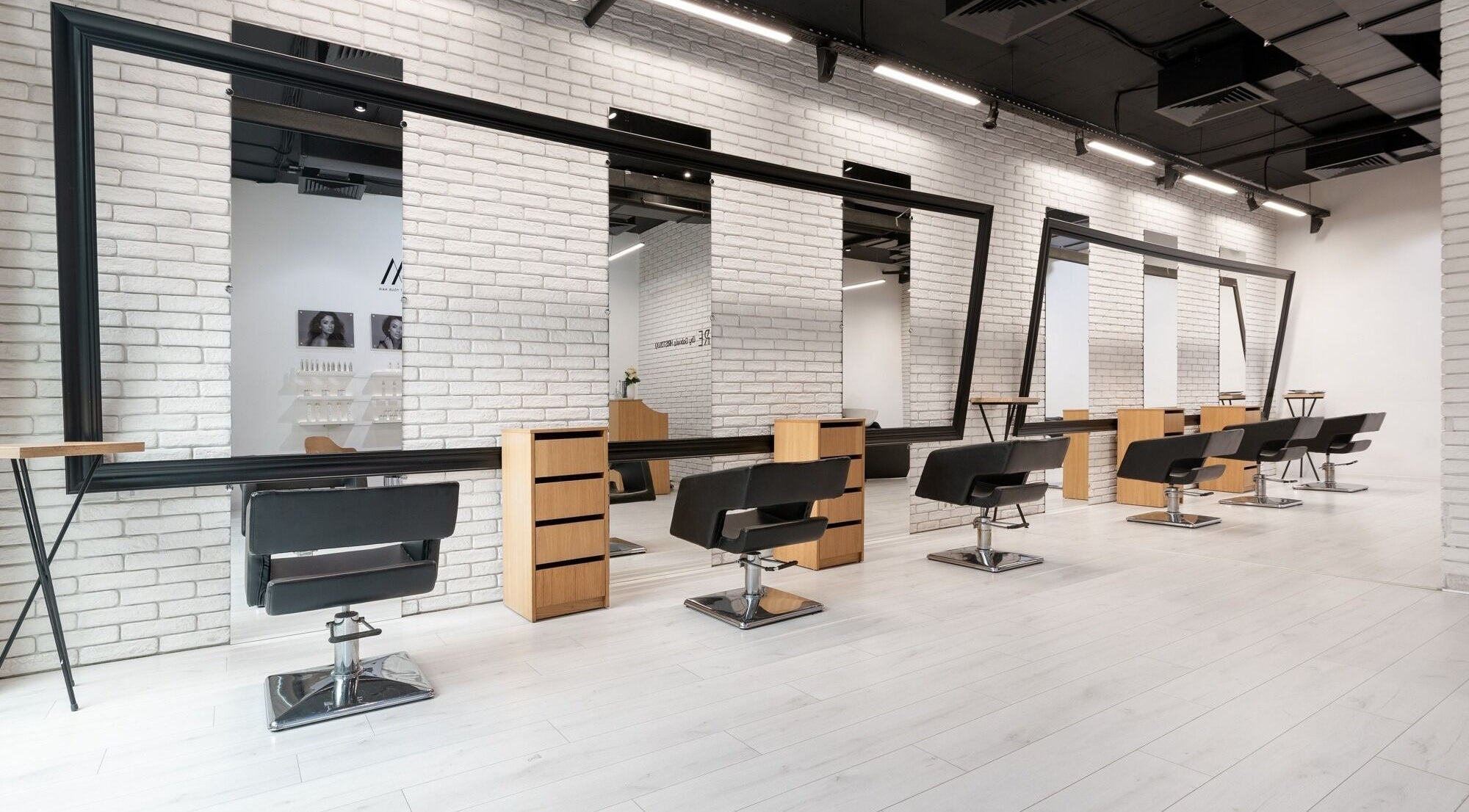 Sleek and modern styling stations at Salon Inspire, kv. Mladost 1, София, BG, showcasing elegance.