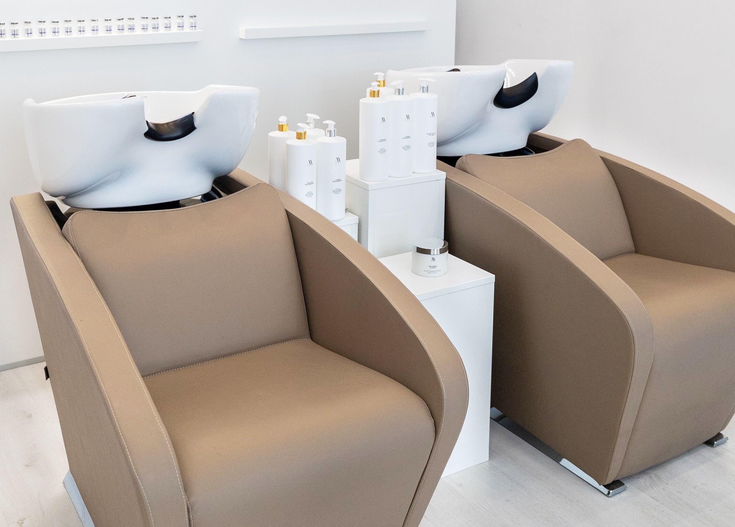 Modern wash stations at Salon Inspire, kv. Iztok, София, BG, offering top-tier hair care services.