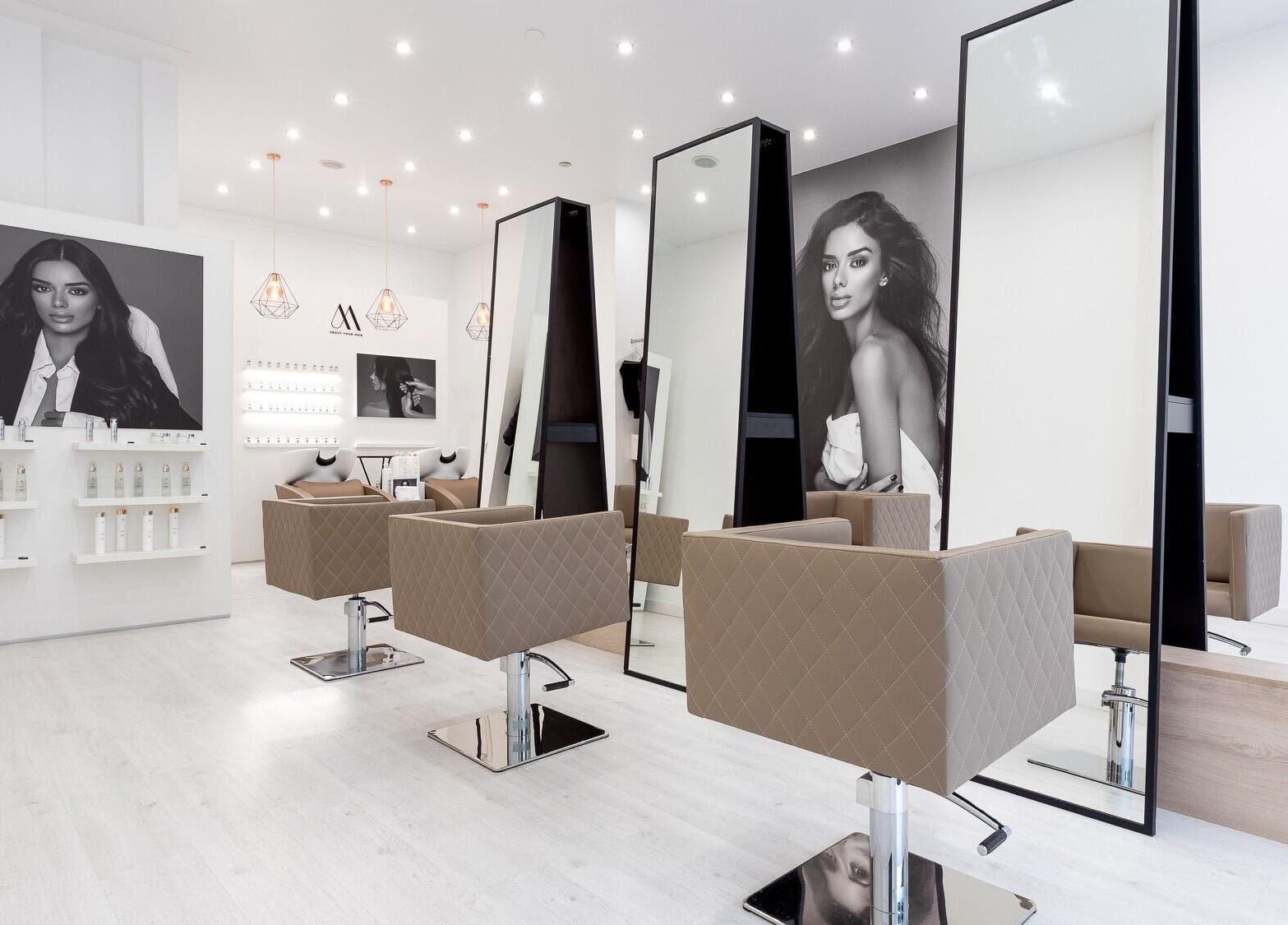 Modern interior of Salon Inspire, kv. Iztok in София, BG with stylish chairs and elegant decor.