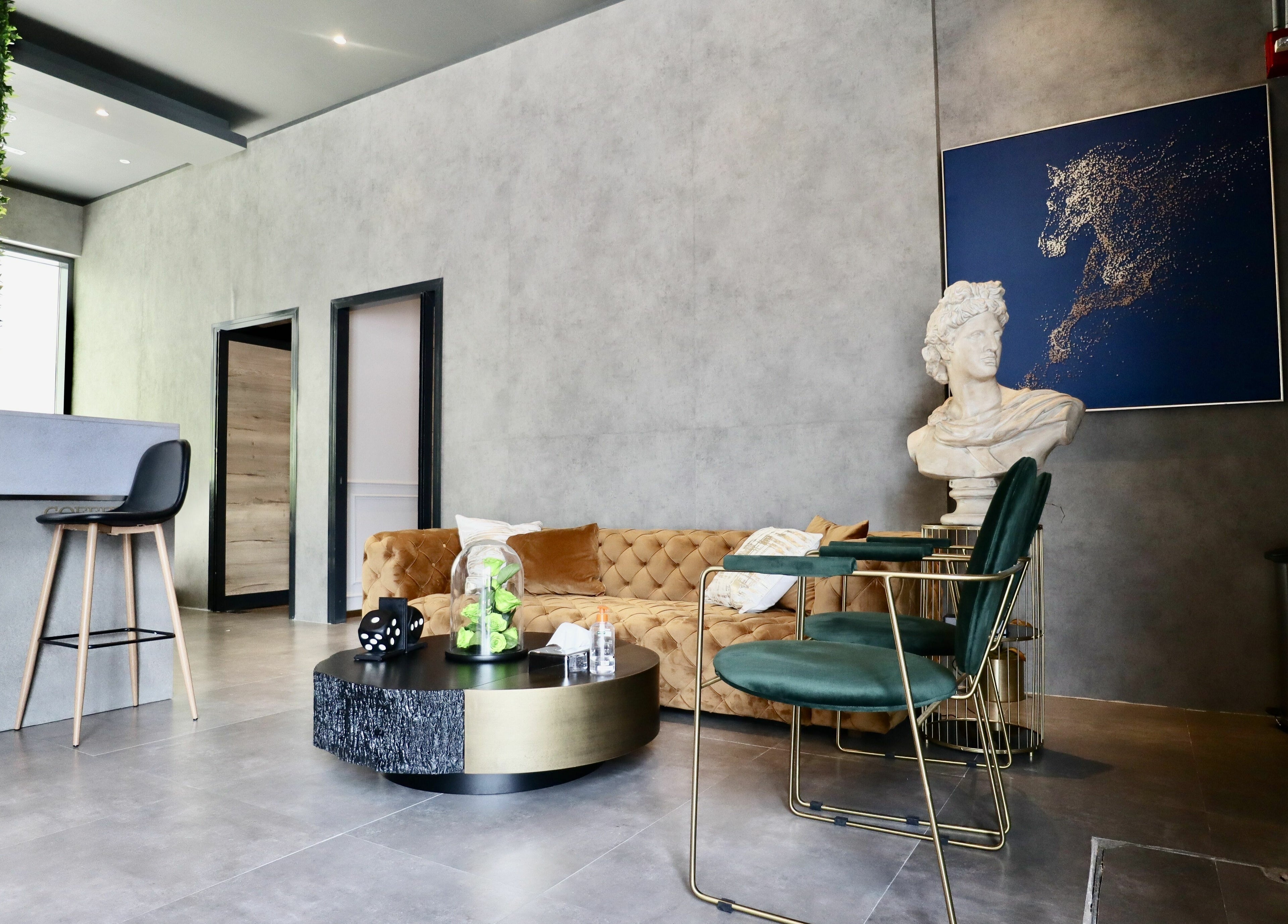 Chic lounge area at House of Fade in Dubai, AE with stylish furniture and artistic decor.