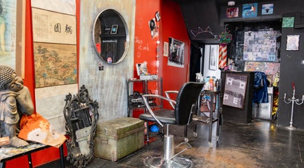 Eclectic salon interior at Unparalleled 145, London, England, GB showcasing unique decor and styling area.