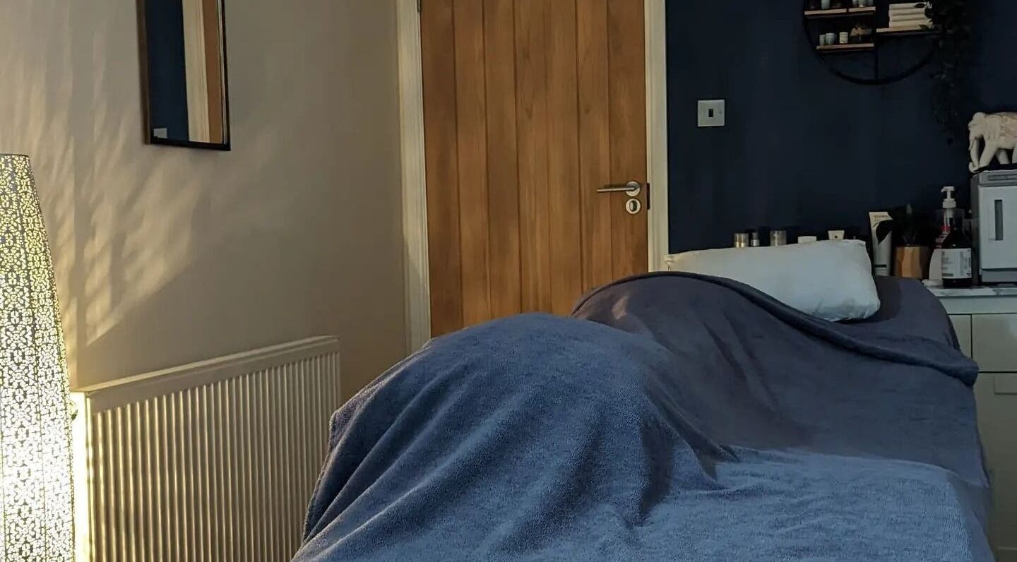 Relaxing massage room at Sensational Beauty in Mirfield, England, GB with cozy lighting and soothing decor.