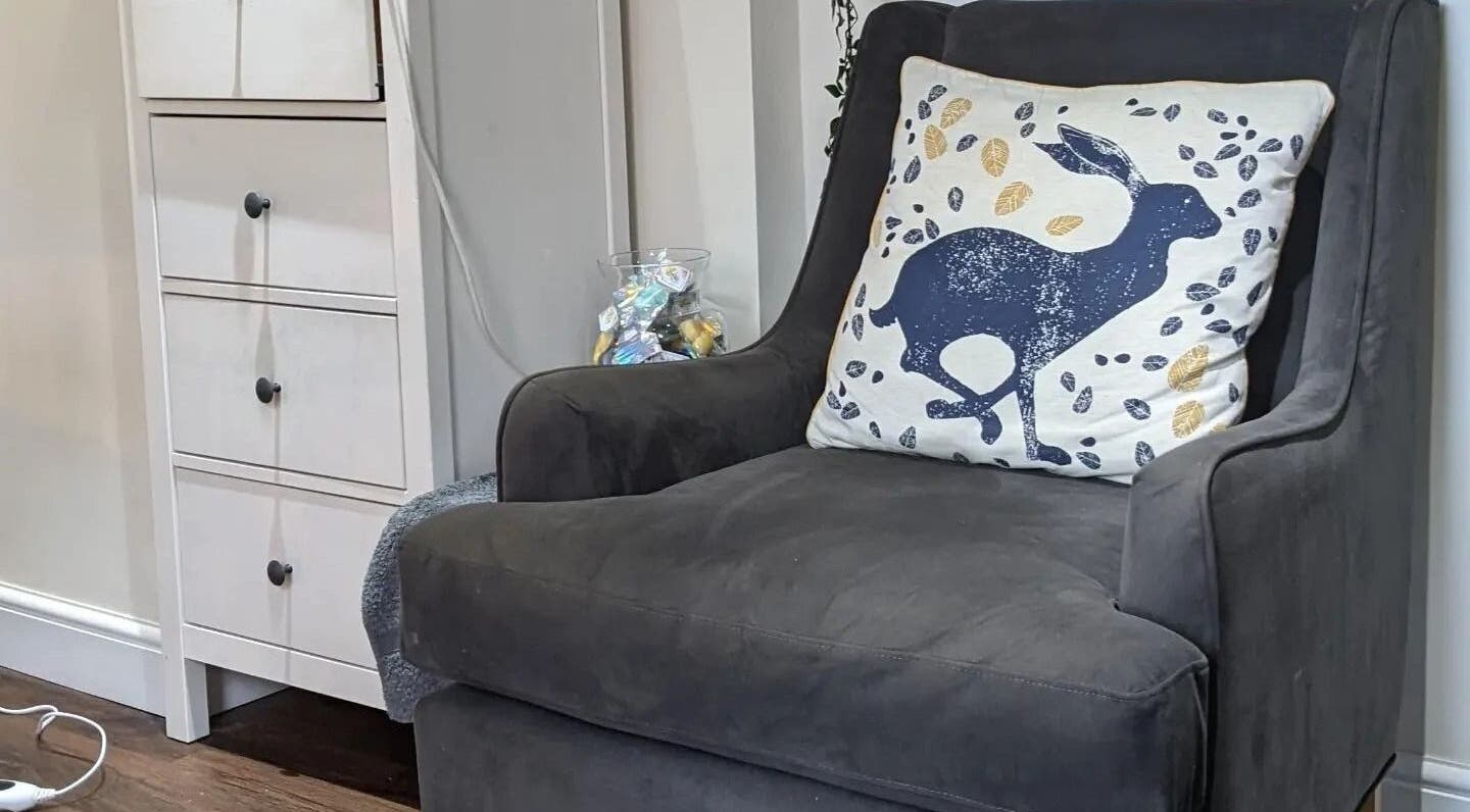 Cozy armchair with stylish cushion in Sensational Beauty, Mirfield, England, GB.