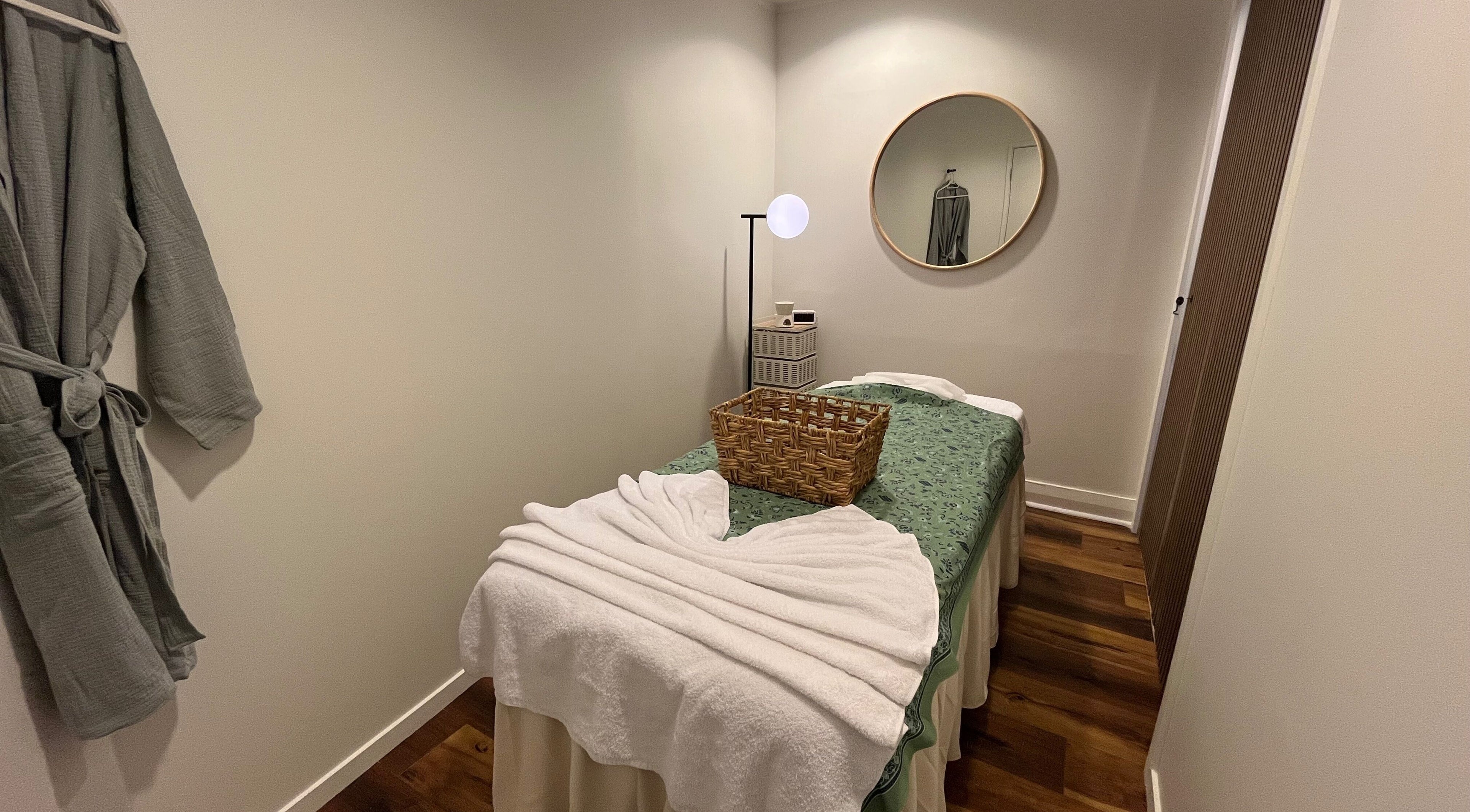 Tranquil massage room at Mellow Massage Mission Bay I Thai Massage and Spa, Auckland, NZ, featuring a treatment table.