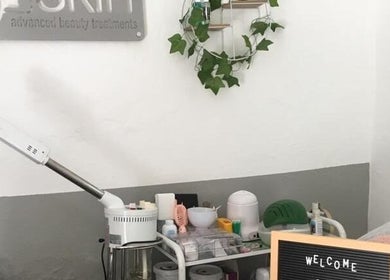 Treatment setup at Skin Advanced Beauty Treatments, Edenvale, Gauteng, ZA with tools and greenery decor.