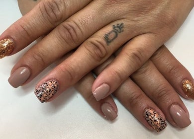 Stylish nail art with glitter at Skin Advanced Beauty Treatments in Edenvale, Gauteng, ZA.
