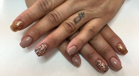 Stylish nail art with glitter at Skin Advanced Beauty Treatments in Edenvale, Gauteng, ZA.