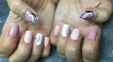 Manicured nails with floral design at Skin Advanced Beauty Treatments in Edenvale, Gauteng, ZA.