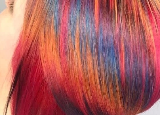 Vibrant multicolored hair styling at Elysian Hair - Looe, Cornwall, Looe, England, GB.