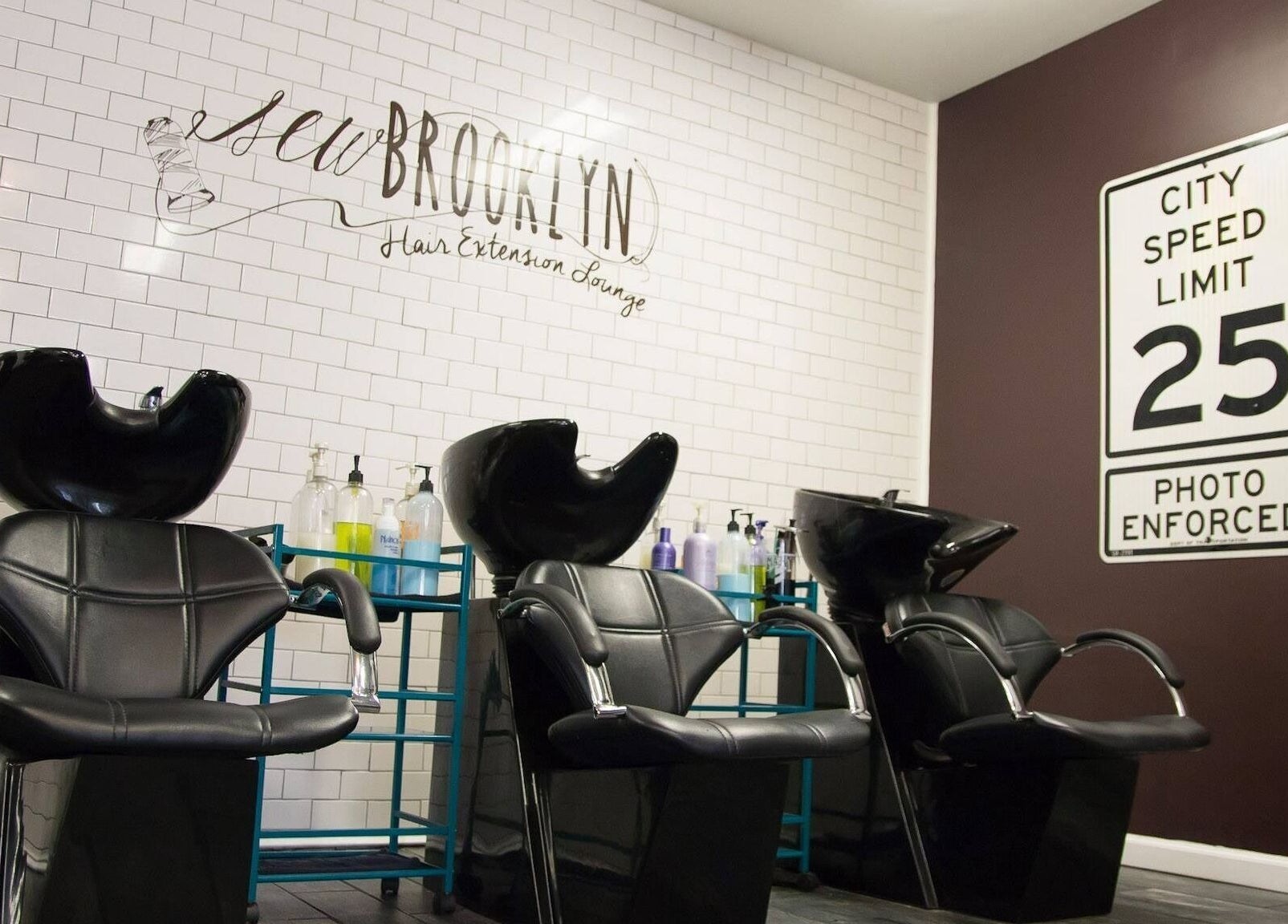 Comfortable black washbasin chairs at Sew Brooklyn Hair Extension Lounge in New York, New York, US.