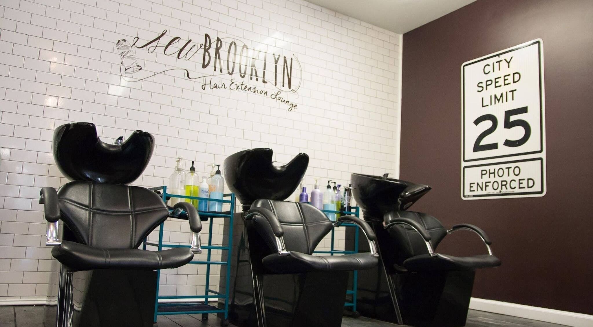 Comfortable black washbasin chairs at Sew Brooklyn Hair Extension Lounge in New York, New York, US.