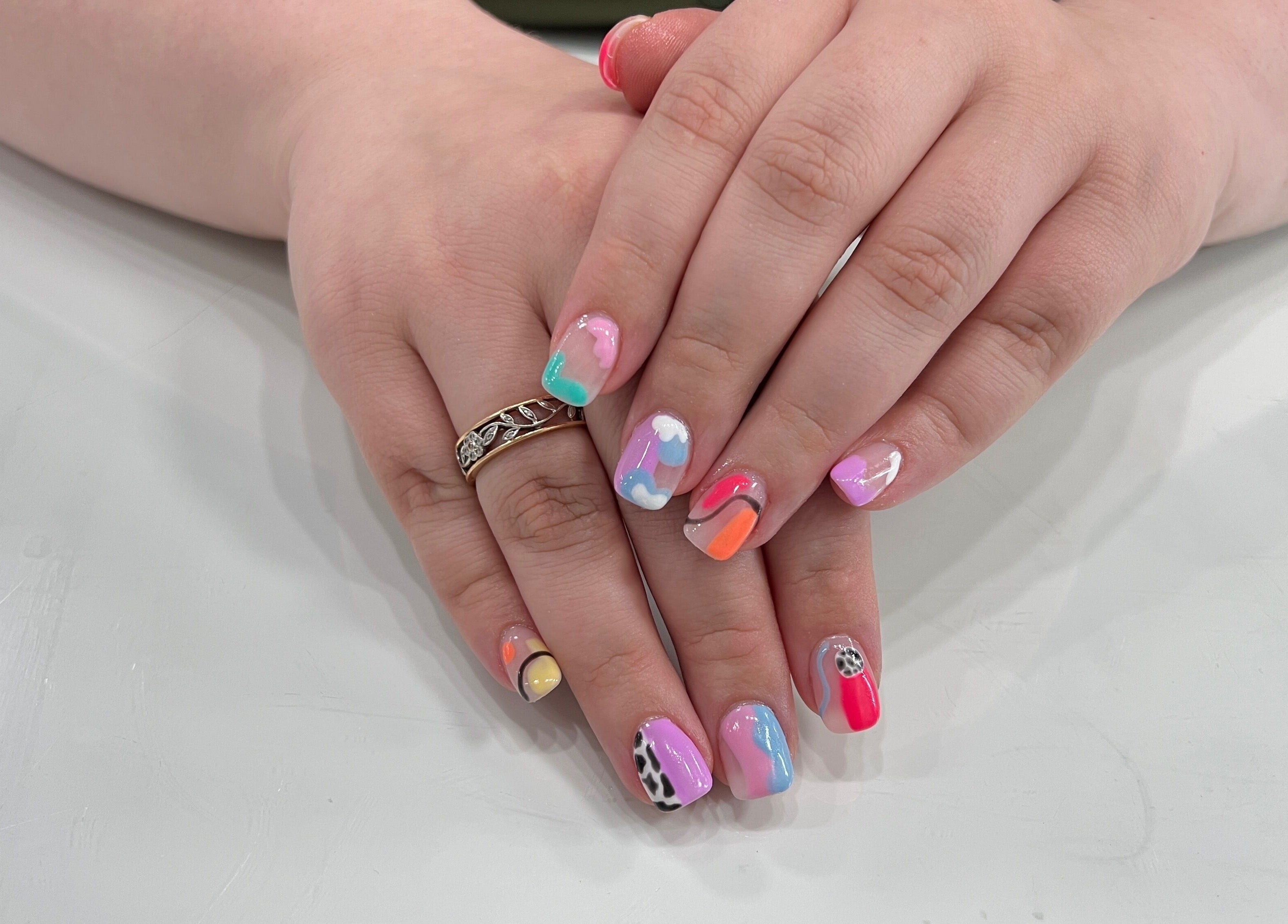 Colorful nail art design at Eversaint Salon in New Orleans, Louisiana, US.