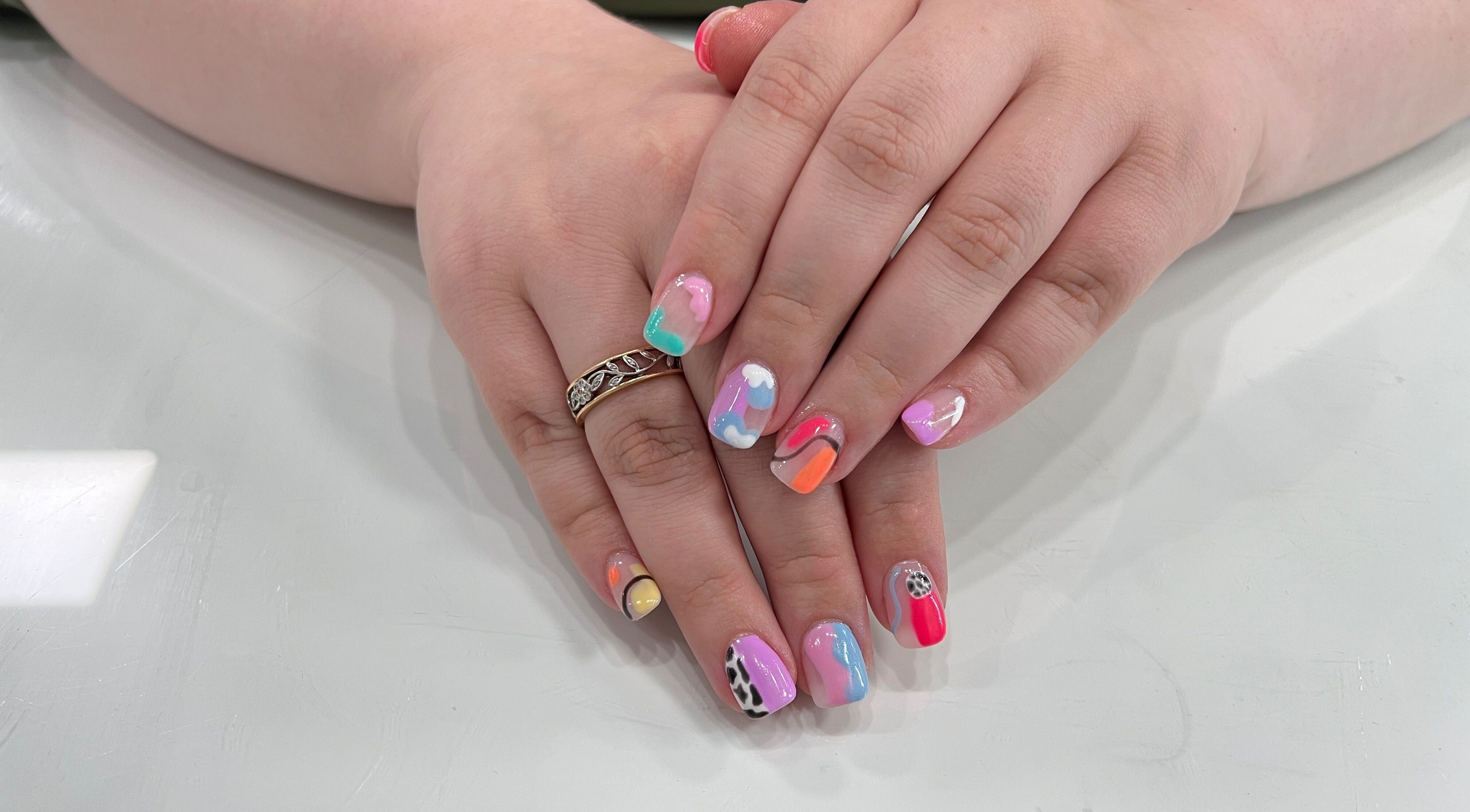 Colorful nail art design at Eversaint Salon in New Orleans, Louisiana, US.