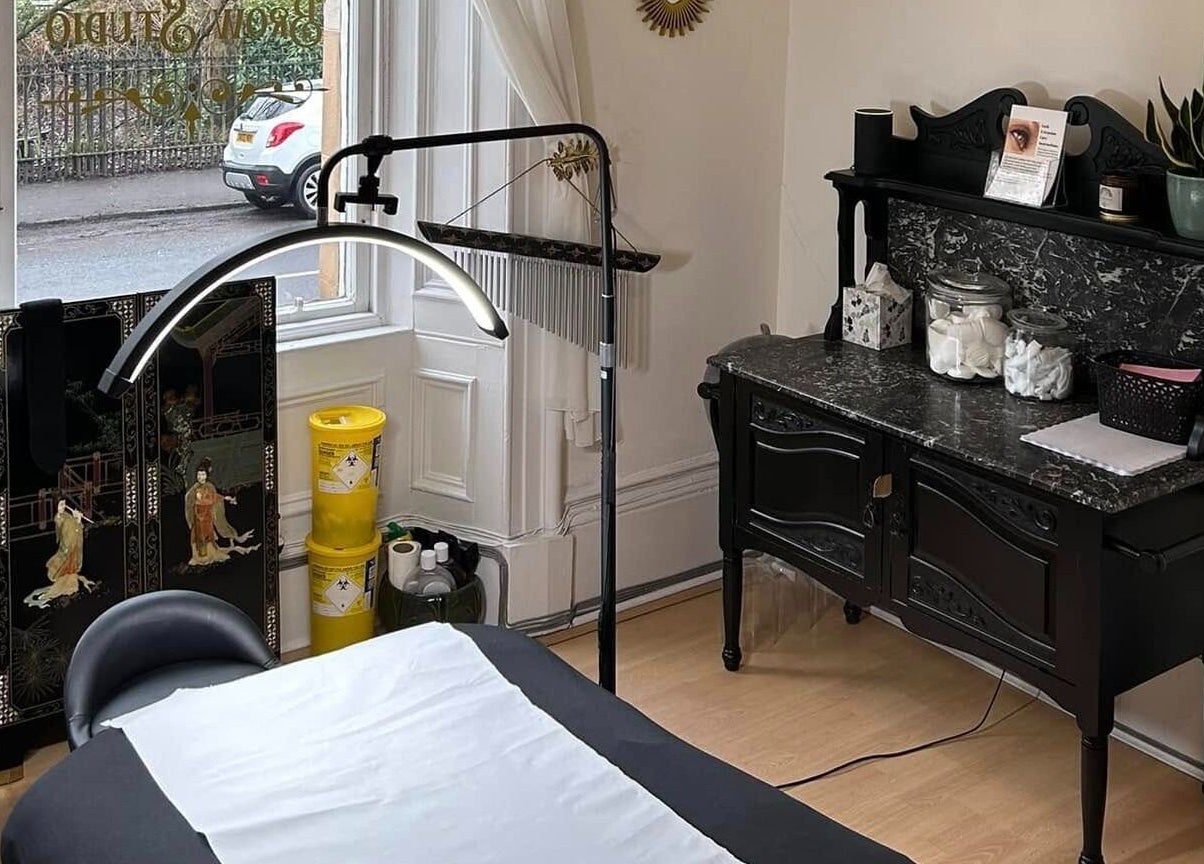 Interior of Miss Highbrow Semi-Permanent Make-up, Lash and Brow Studio in Glasgow, Scotland, featuring a treatment bed.