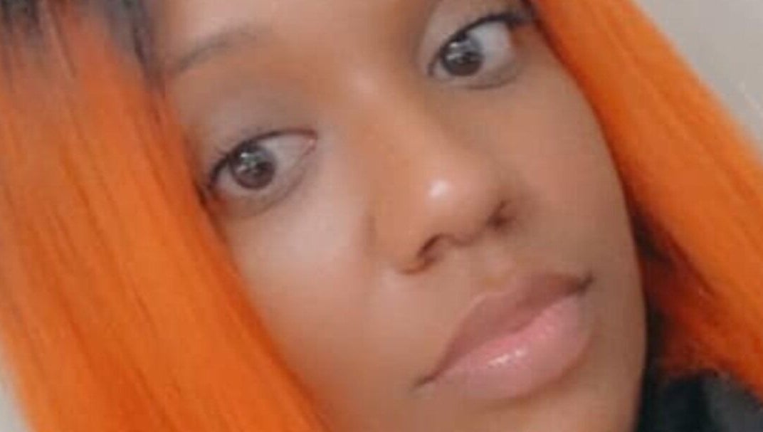 Close-up of vibrant hairstyle at Shear Luxe Salon, Lake Charles, Louisiana, US, showcasing stunning orange tones.