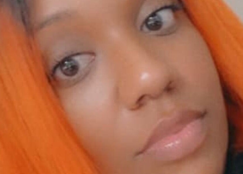 Close-up of vibrant hairstyle at Shear Luxe Salon, Lake Charles, Louisiana, US, showcasing stunning orange tones.