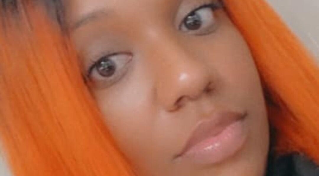 Close-up of vibrant hairstyle at Shear Luxe Salon, Lake Charles, Louisiana, US, showcasing stunning orange tones.