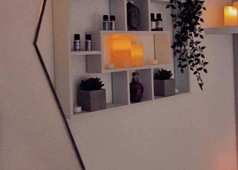 Calming candle-lit shelf with succulents at Cassini Beauty by Becci in Stourbridge, England, GB.