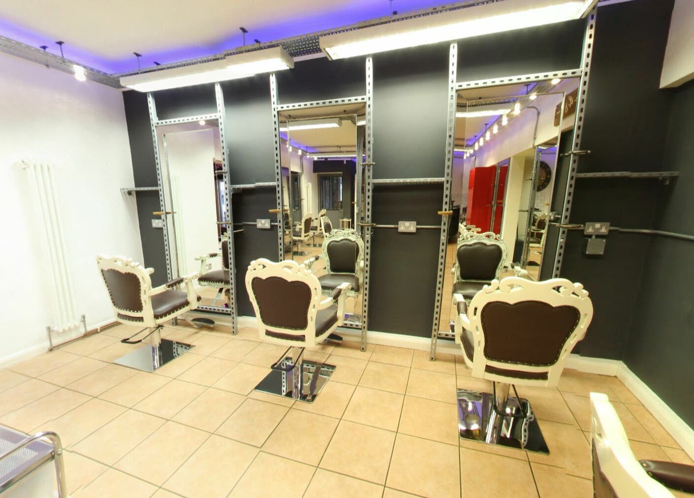 Chic salon interior with stylish chairs at Vo La Si, Guisborough, England, GB.