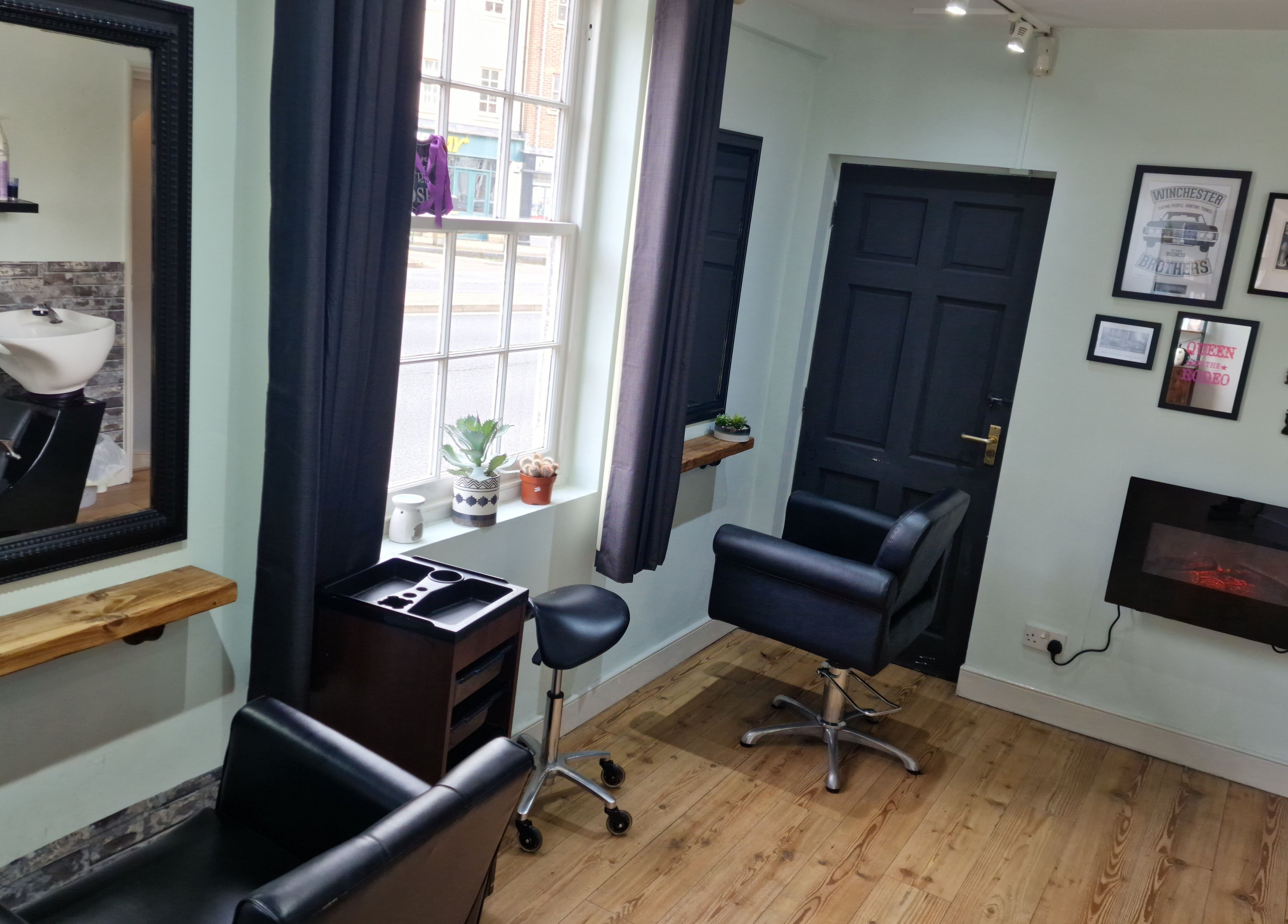 Elegant salon interior at Alter Ego, Worcester, England, GB, featuring stylish chairs and modern decor.