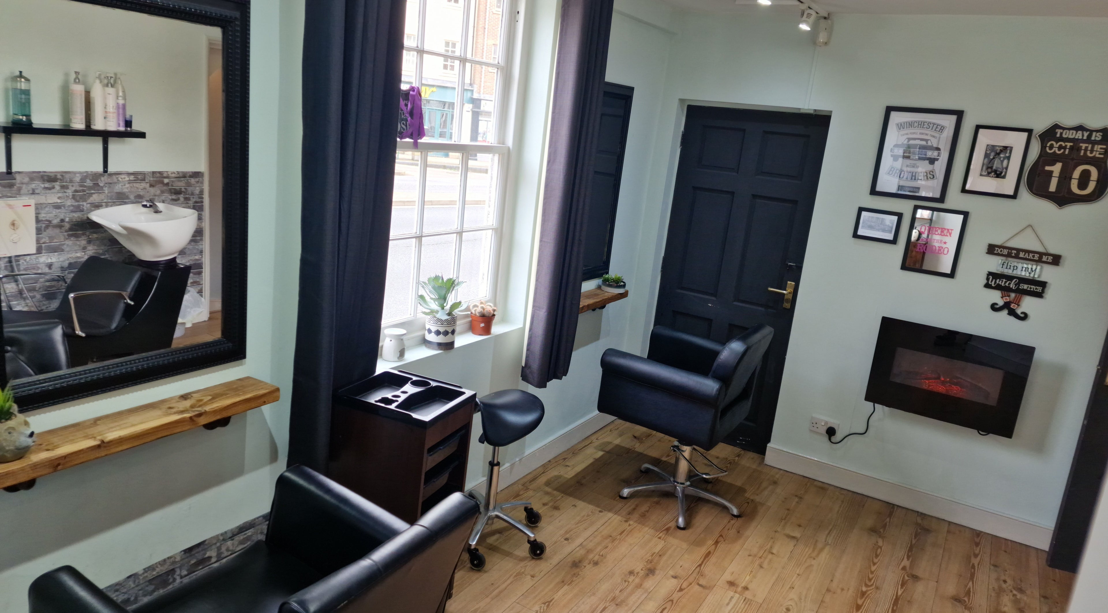 Elegant salon interior at Alter Ego, Worcester, England, GB, featuring stylish chairs and modern decor.