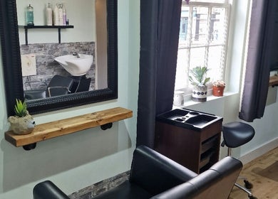 Elegant salon space at Alter Ego, Worcester, England, GB with modern decor and natural lighting.