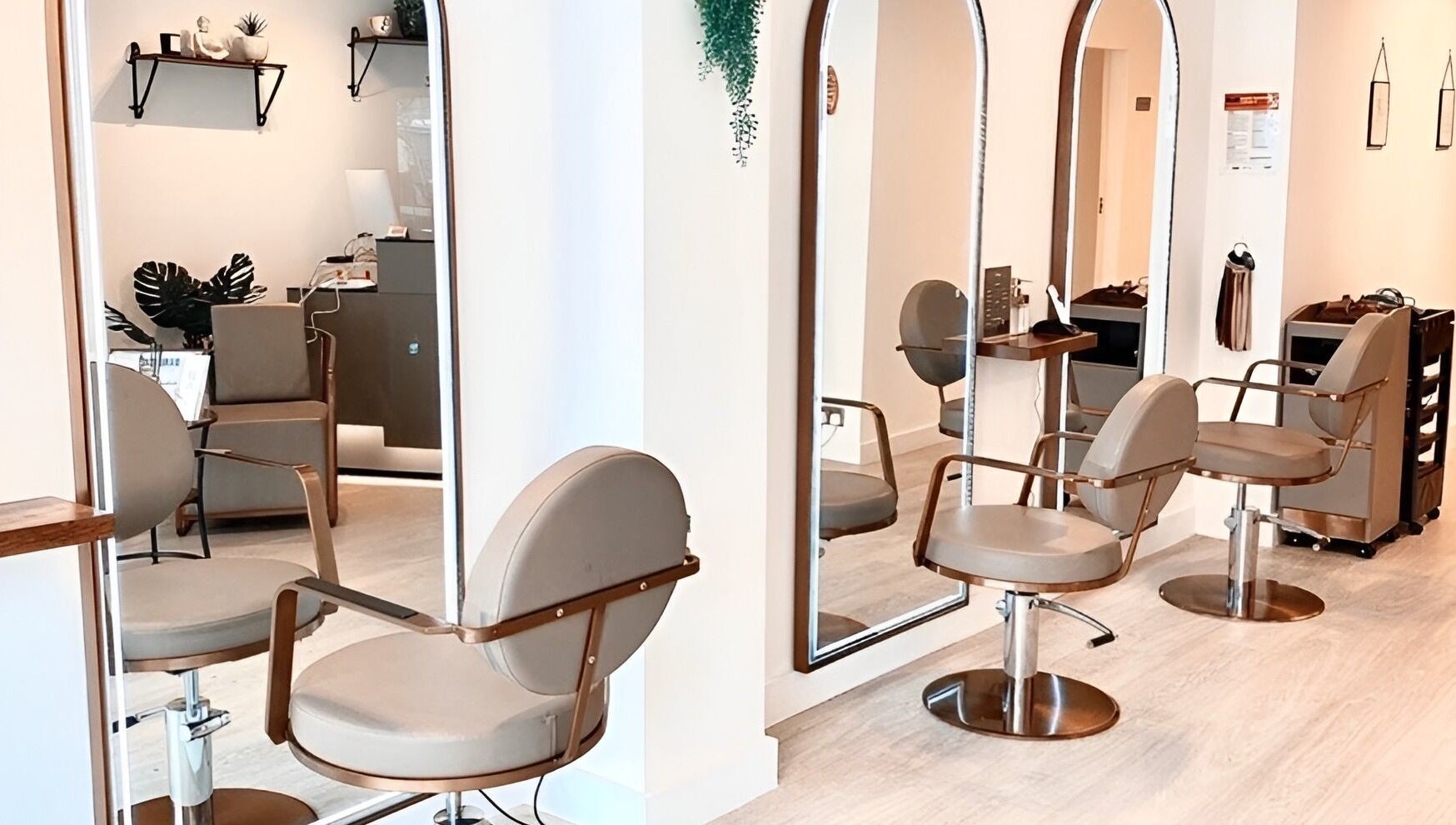 Stylish seating and mirrors at Becca Hair and Beauty Salon, Barnet, England, GB for a luxurious experience.