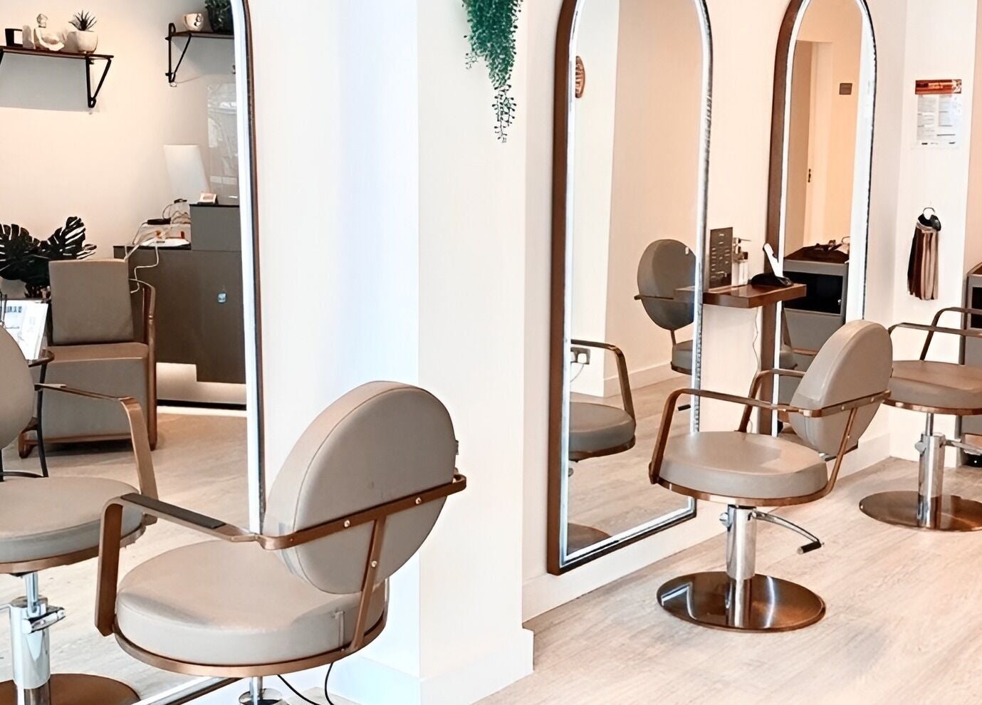 Stylish seating and mirrors at Becca Hair and Beauty Salon, Barnet, England, GB for a luxurious experience.