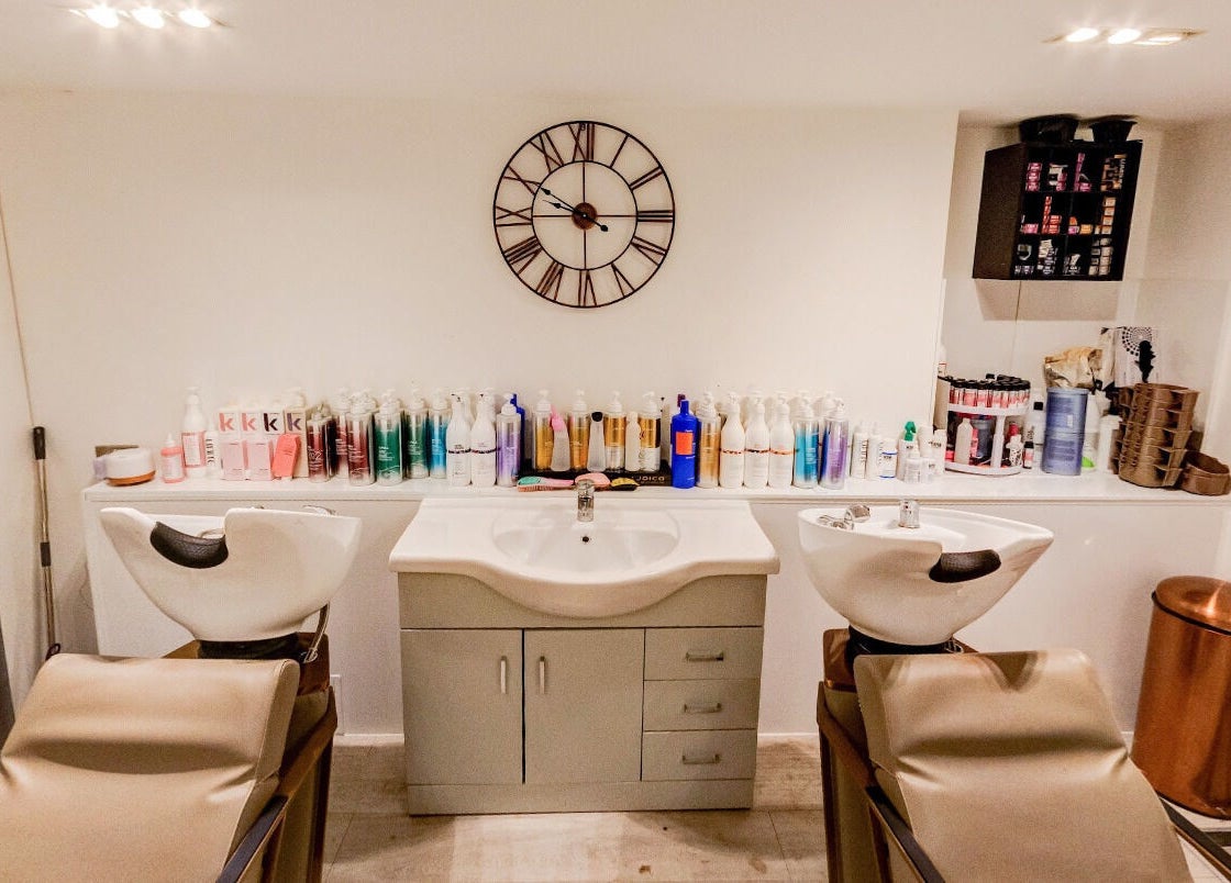Modern salon wash stations at Becca Hair and Beauty Salon, Barnet, England, GB; stylish and inviting setting.