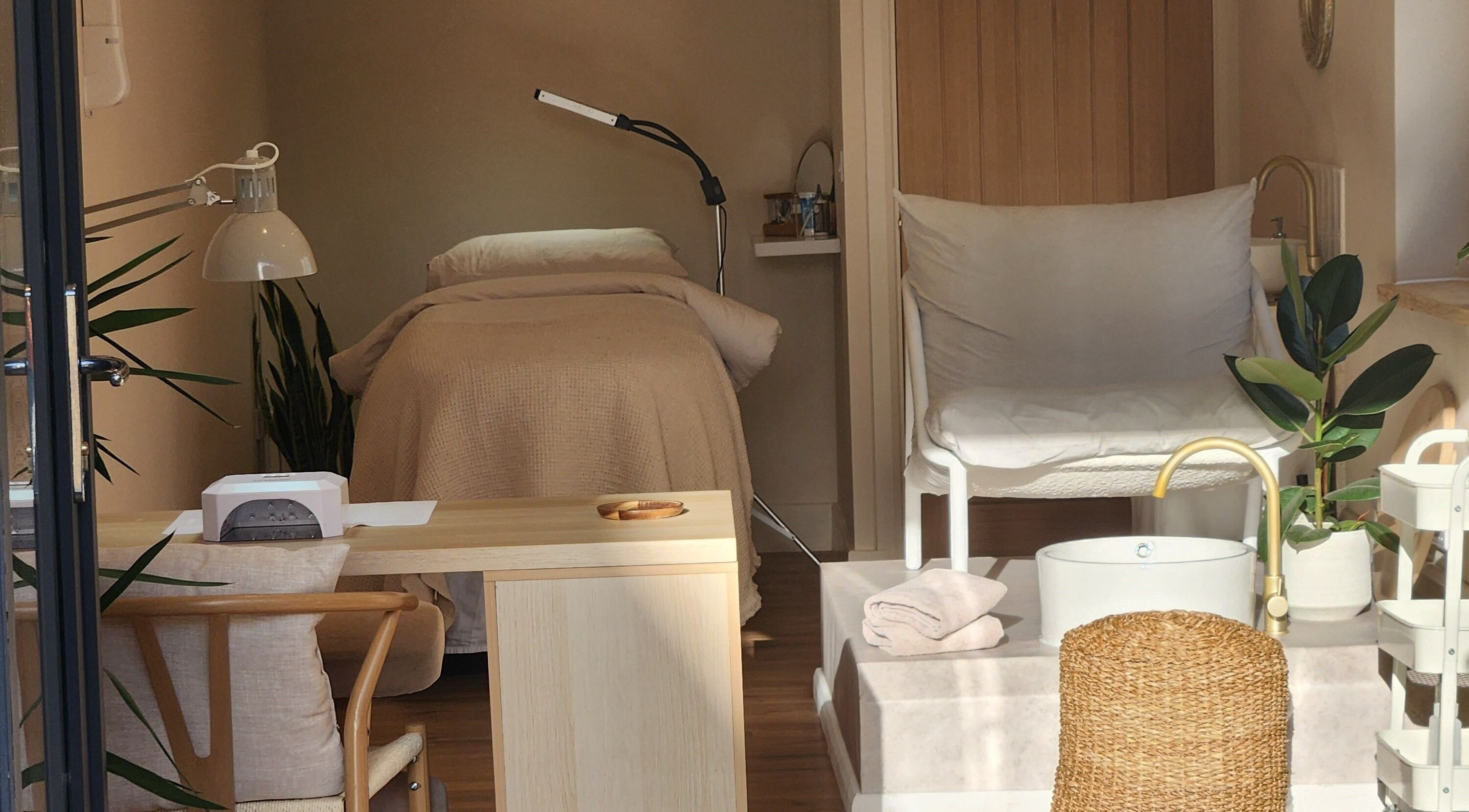 Inviting manicure station at Narmiss Nails and Beauty, Yaxley, England, GB, featuring comfortable seating and decor.