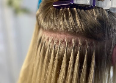 Detailed hair extension process at Lengths | By CJP in Writtle, England, GB showcasing precision technique.